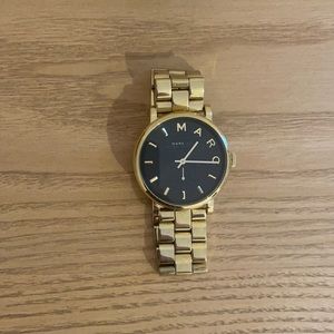 Marc Jacobs black and gold watch